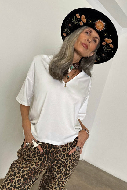 Never Fully Dressed White T-Shirt with Shoulder Pads